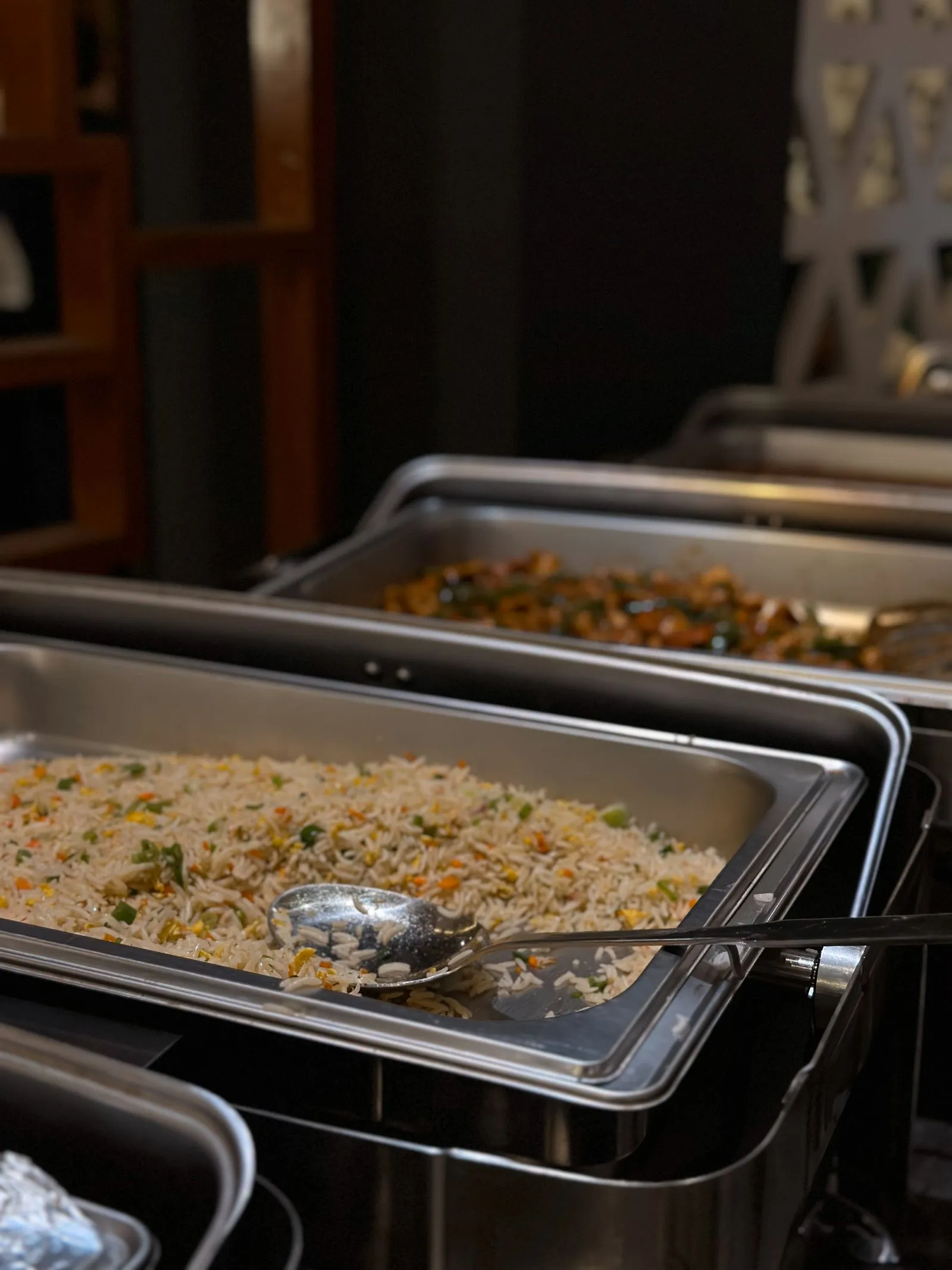 Buffet catering trays of food for a wedding reception — 30-guest wedding reception under $3,000